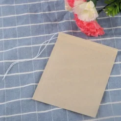 100 stk. engangs tomme tebreve filterinfuser med snøre til løsbladet te (L)