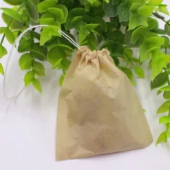 100 stk. engangs tomme tebreve filterinfuser med snøre til løsbladet te (L)