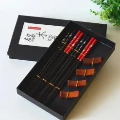 Elegant sæt sushi spisepinde med stativer New