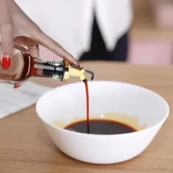 2-Pak Kork til Olivenolie Hældetud Drypkork med låg Guld